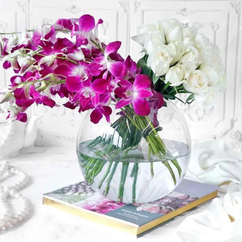 Orchid and White Roses Arrangement
