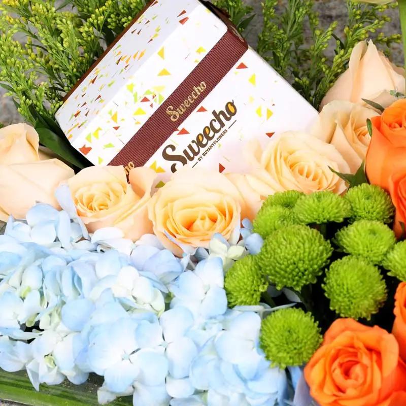 Sky Flowers and Chocolate Arrangement