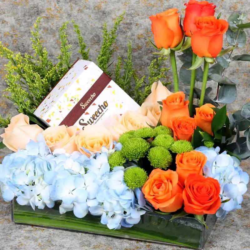 Sky Flowers and Chocolate Arrangement