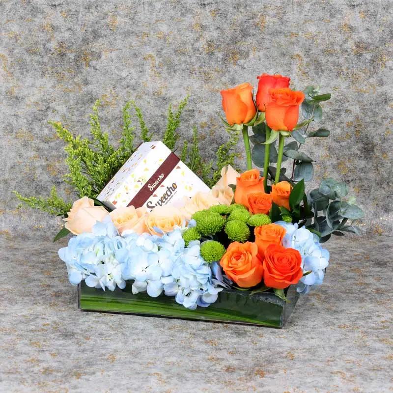 Sky Flowers and Chocolate Arrangement